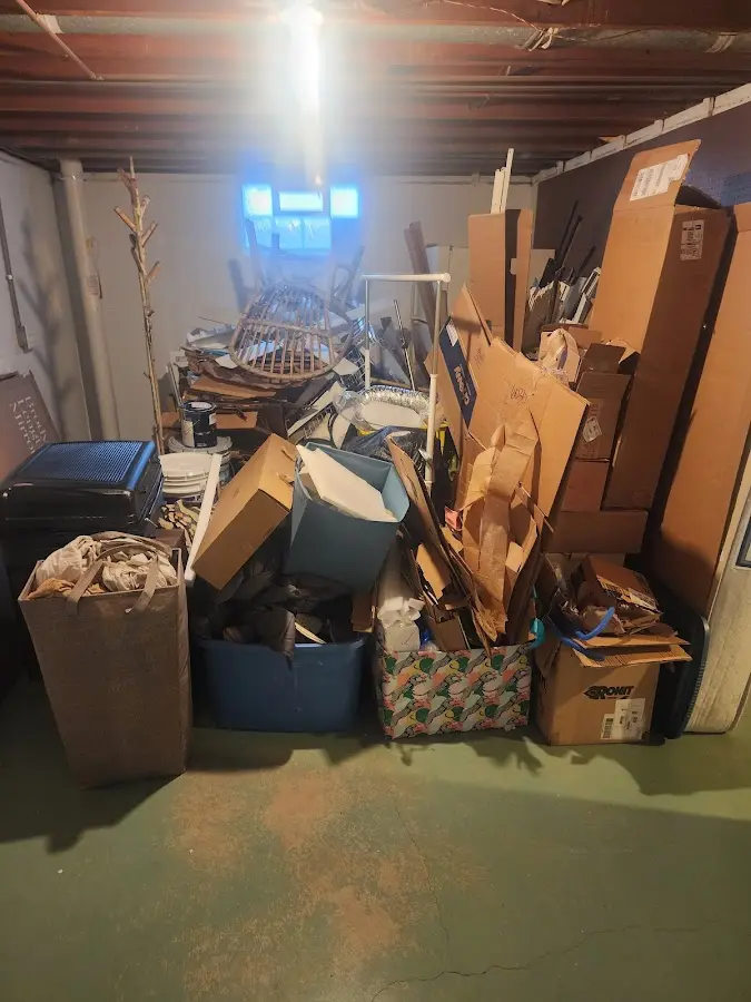 Roll-off dumpster container at job site for Concrete Dumpster Rental in Roxbury